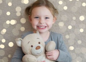 Child and Teddy Bear